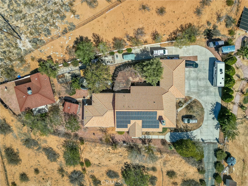 20430 Rancherias Road Apple Valley, CA 92307 - Photo 45 of 48 an aerial view of a house with a yard and large tree