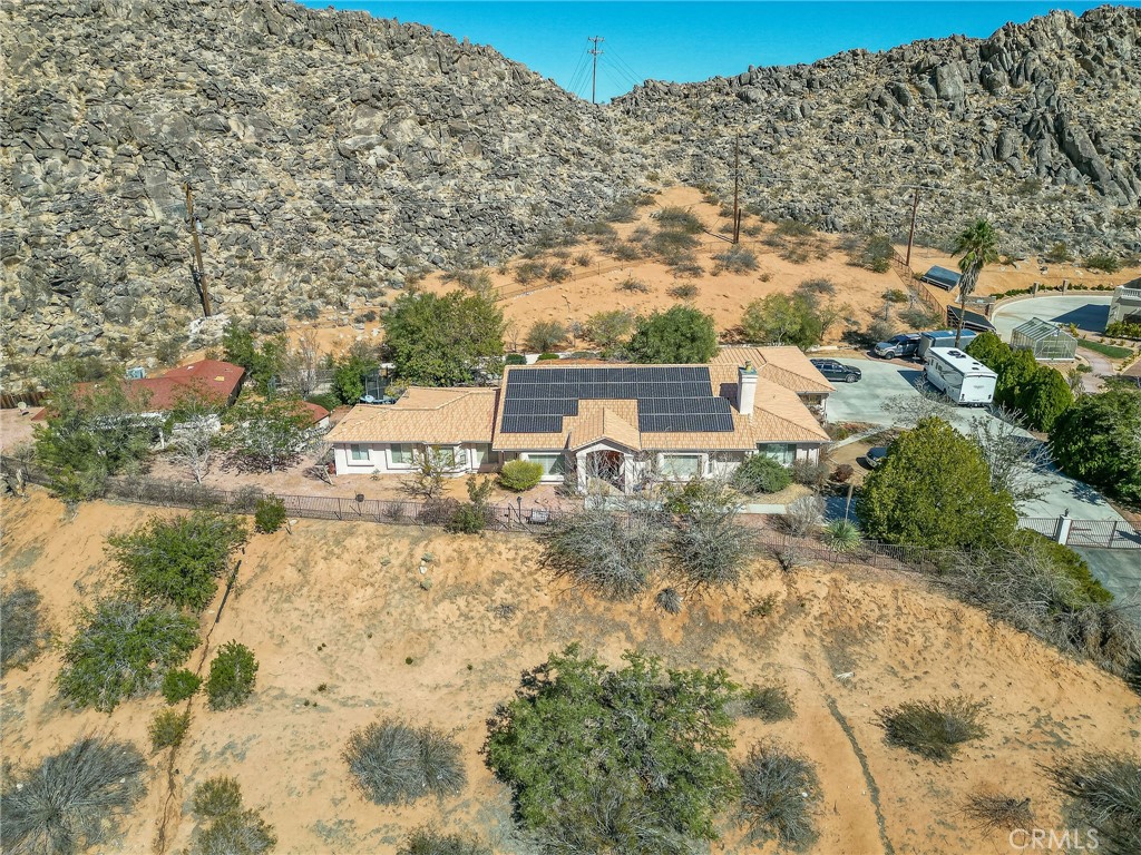 20430 Rancherias Road Apple Valley, CA 92307 - Photo 46 of 48 a view of a house with a yard