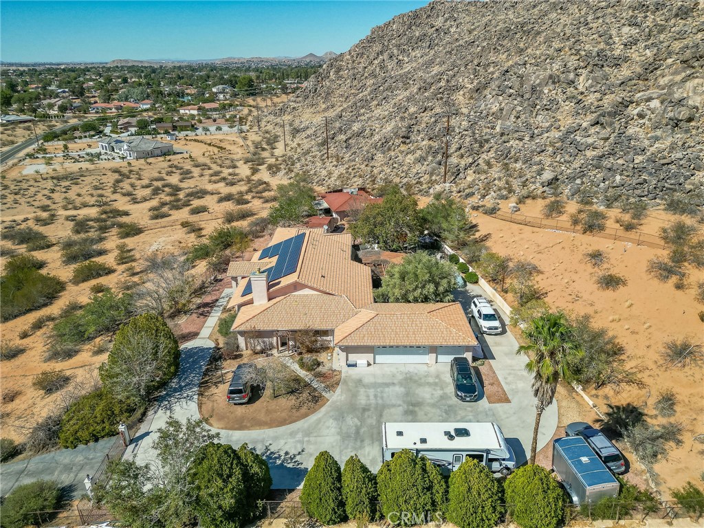 20430 Rancherias Road Apple Valley, CA 92307 - Photo 48 of 48 an aerial view of residential houses with outdoor space