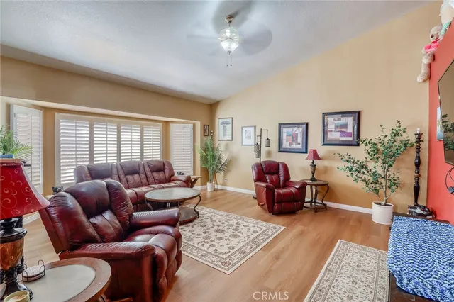 a kitchen with a stove a refrigerator and a sink
