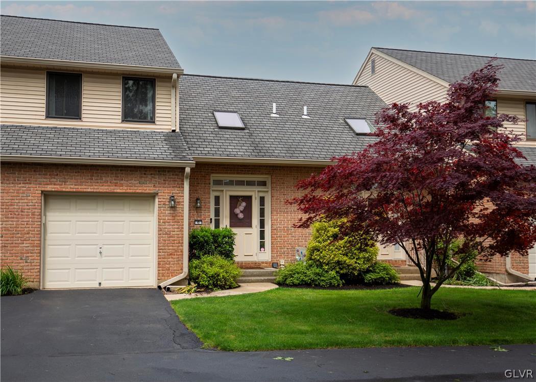 1201 Butztown Road, Unit 6 Bethlehem, PA 18017 - Photo 1 of 20 a front view of house with yard and green space