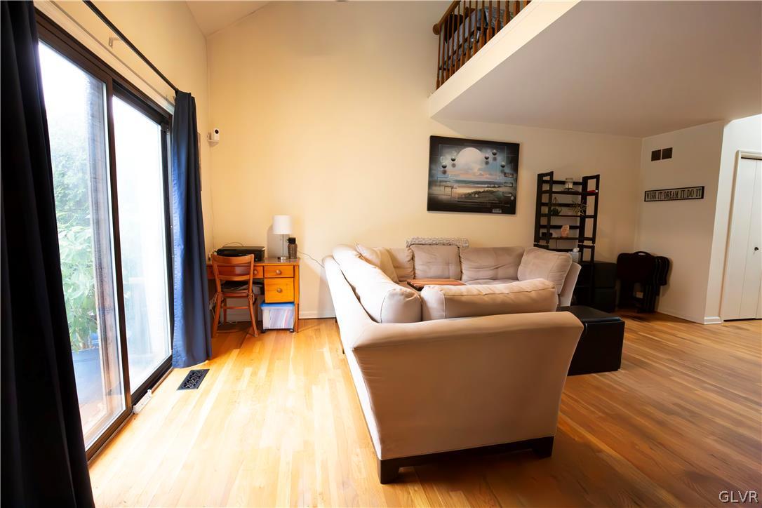 1201 Butztown Road, Unit 6 Bethlehem, PA 18017 - Photo 8 of 20 a living room with furniture and a large window