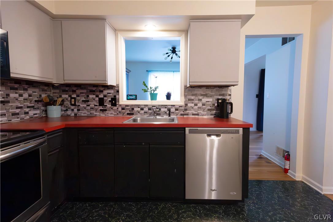 1201 Butztown Road, Unit 6 Bethlehem, PA 18017 - Photo 10 of 20 a kitchen with a sink and cabinets