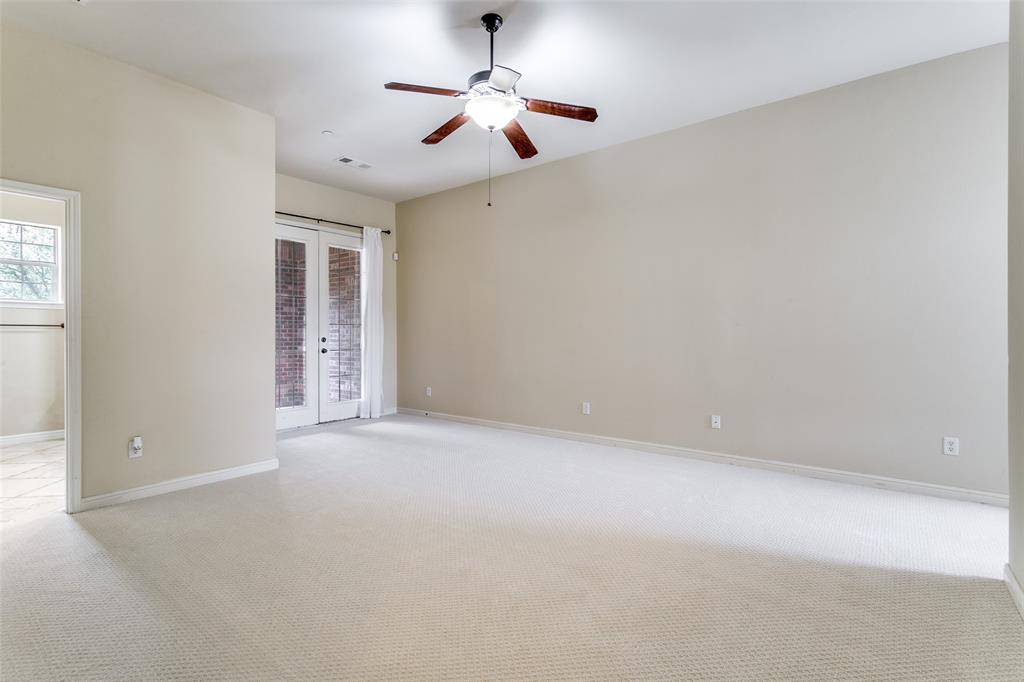 8608 Augustine Road Irving, TX 75063 - Photo 19 of 26 a view of an empty room with a window