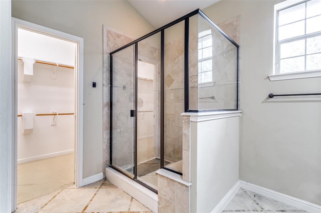 8608 Augustine Road Irving, TX 75063 - Photo 22 of 26 a view of a bathroom with mirror