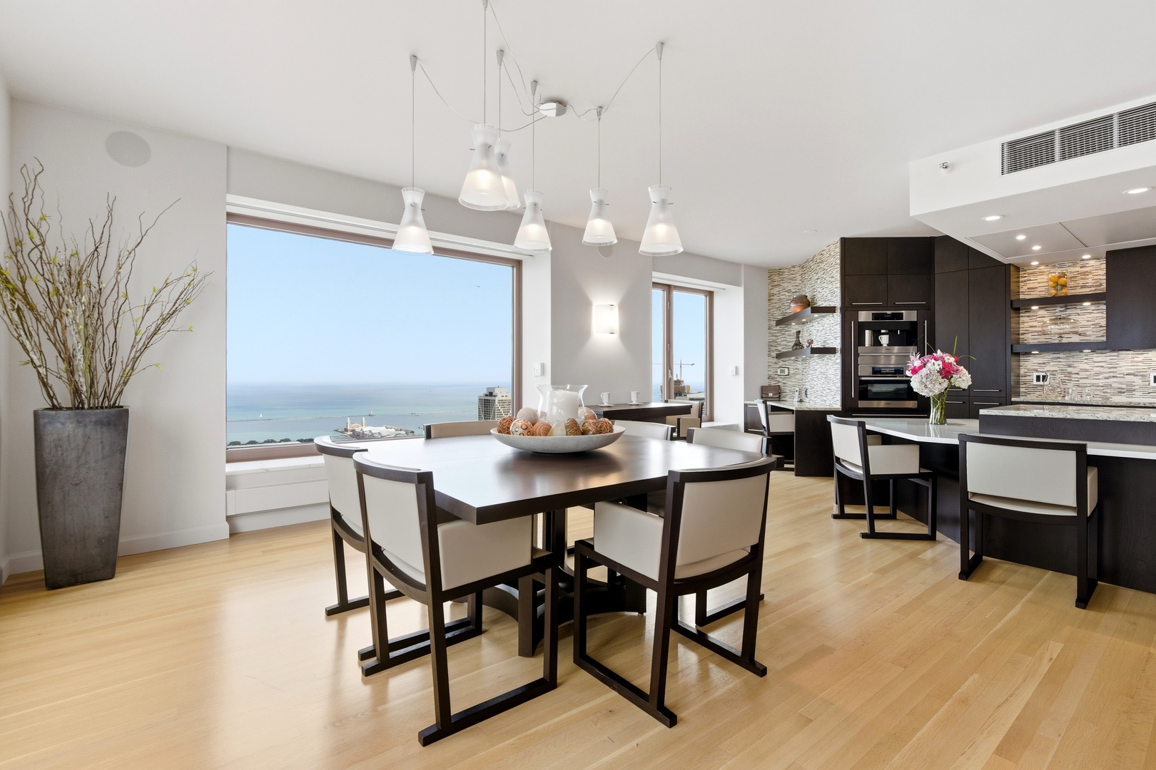 161 East Chicago Avenue, Unit 53A Chicago, IL 60611 - Photo 17 of 47 a view of a dining room with furniture