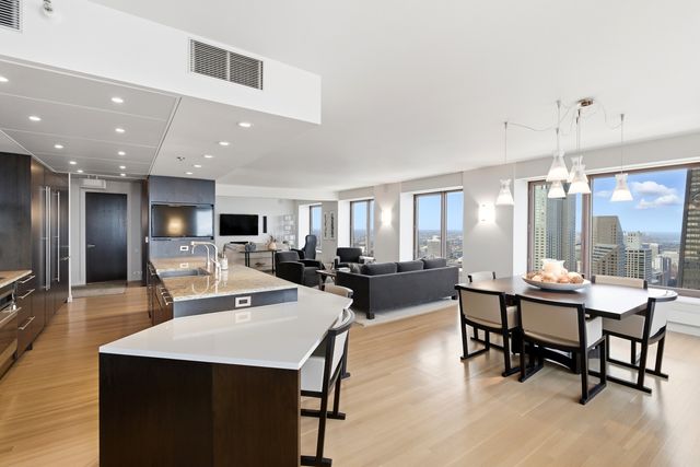 a view of a dining room with furniture