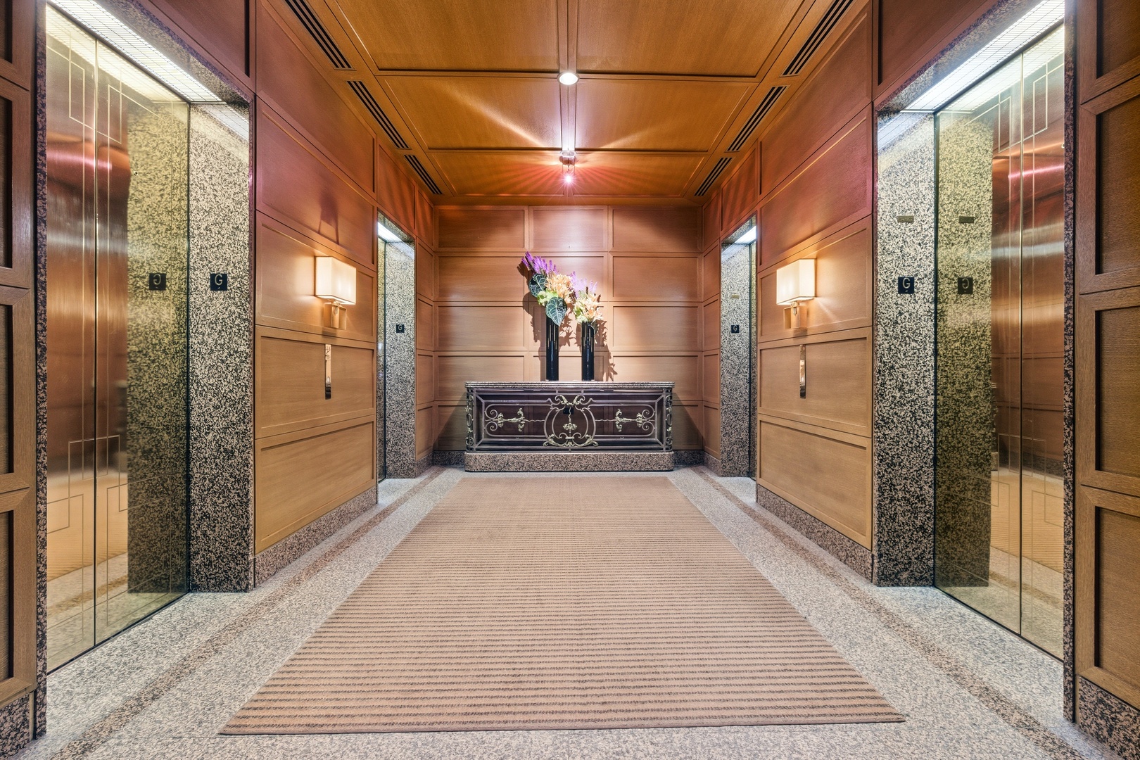161 East Chicago Avenue, Unit 53A Chicago, IL 60611 - Photo 41 of 47 a view of a hallway with wooden floor