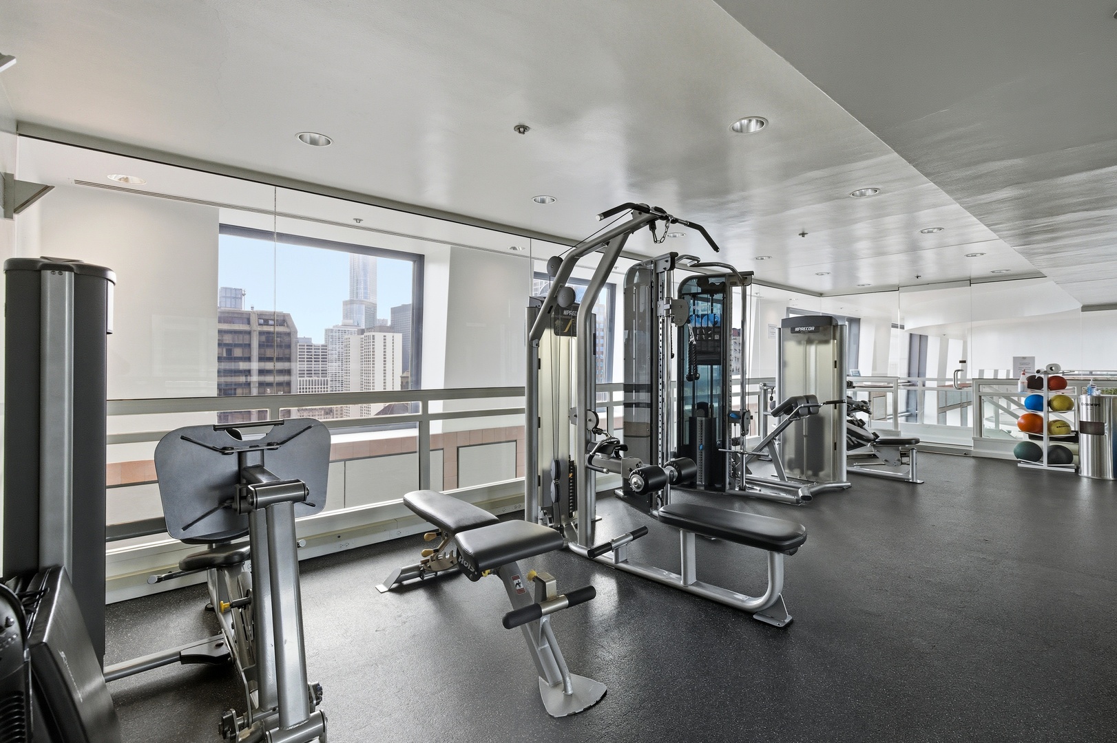 161 East Chicago Avenue, Unit 53A Chicago, IL 60611 - Photo 45 of 47 a view of a room with gym equipment