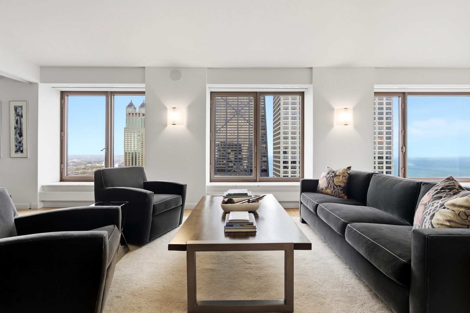 161 East Chicago Avenue, Unit 53A Chicago, IL 60611 - Photo 5 of 47 a living room with furniture and a large window