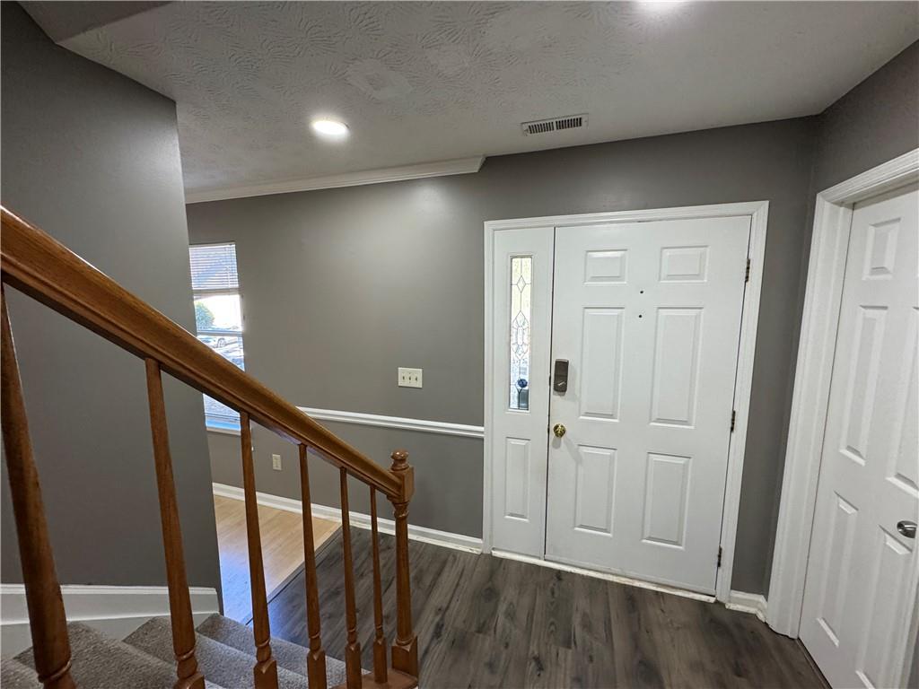 2630 Garland Way Duluth, GA 30096 - Photo 13 of 22 a view of an entryway with wooden floor