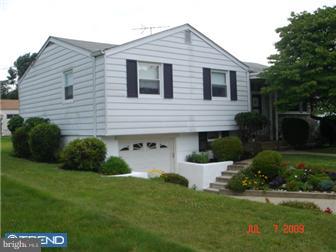 11602 Stevens Road Philadelphia, PA 19116 - Photo 3 of 12 a front view of a house with a yard