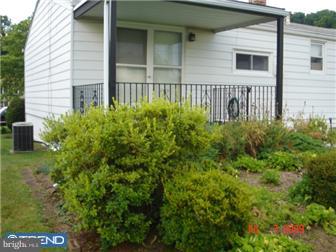 11602 Stevens Road Philadelphia, PA 19116 - Photo 6 of 12 a front view of a house with a yard