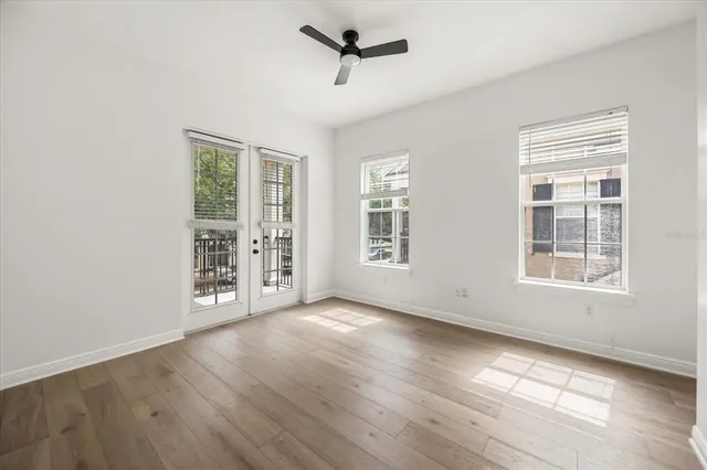 a bathroom with a double vanity sink mirror and toilet