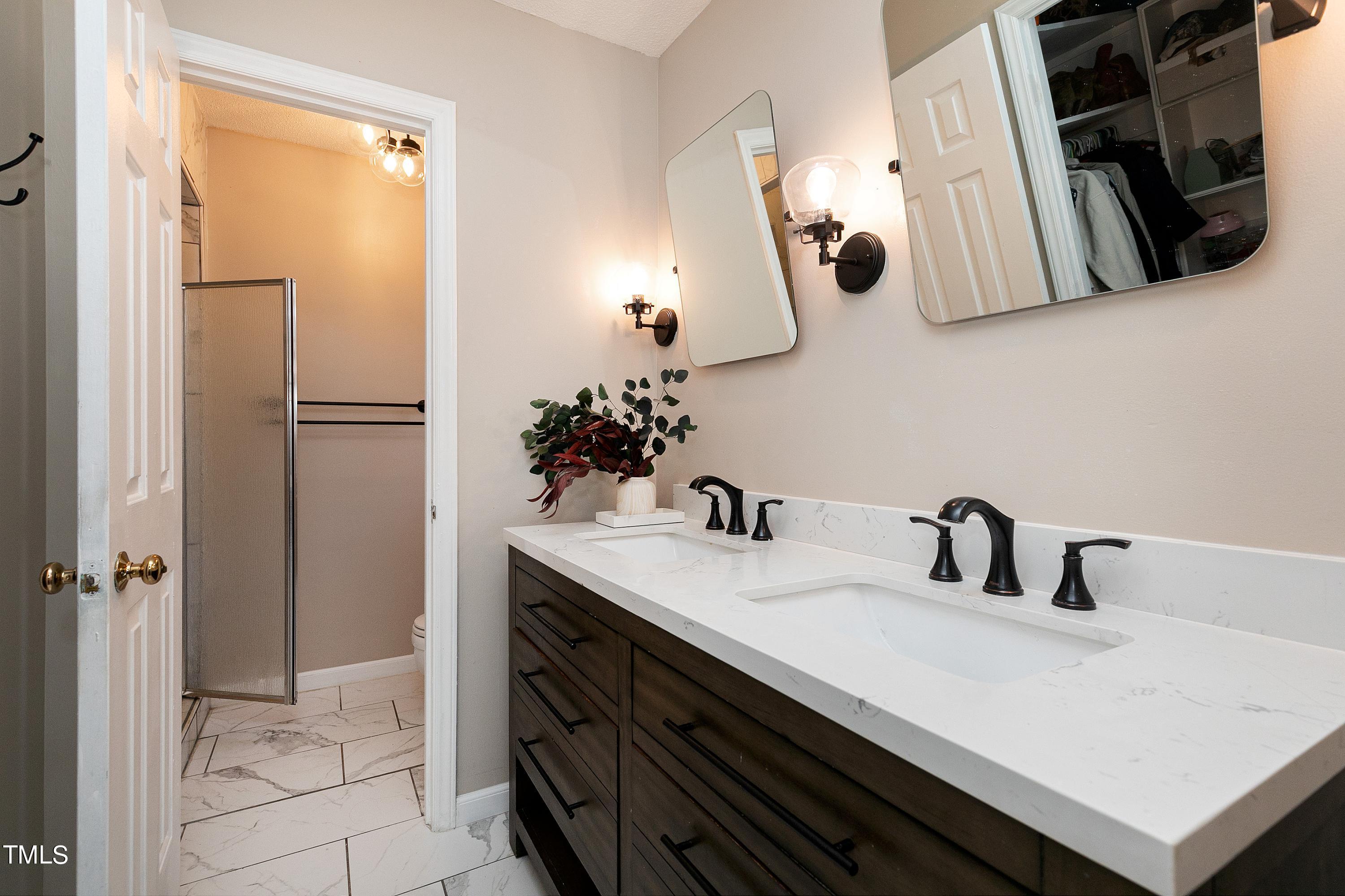 10021 Sycamore Road Raleigh, NC 27613 - Photo 22 of 40 Primary bath