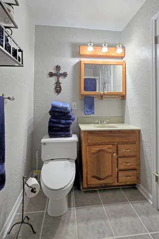 a bathroom with a tub and a sink