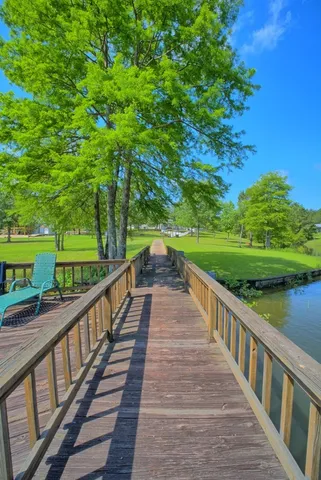 a view of swimming pool with a patio