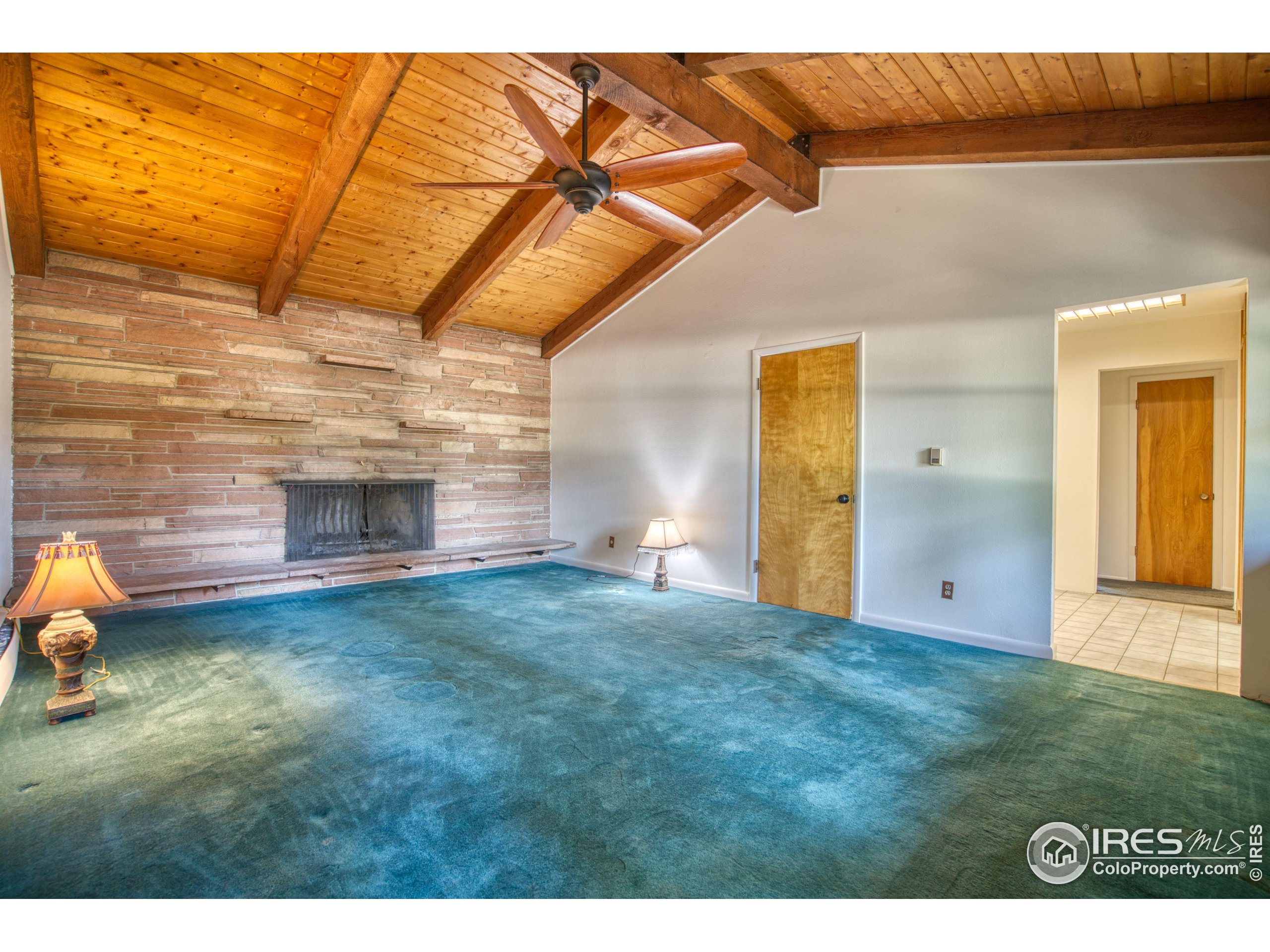5511 Pioneer Road Boulder, CO 80301 - Photo 11 of 28 a view of empty room with ceiling fan