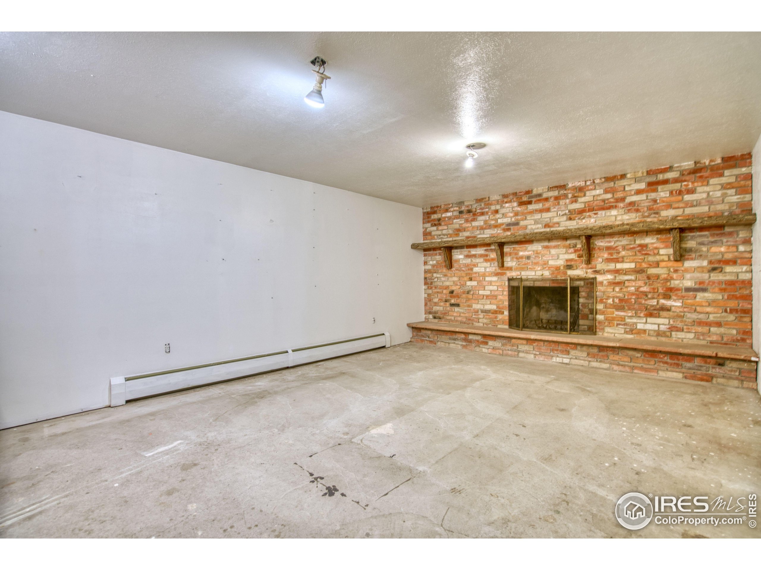 5511 Pioneer Road Boulder, CO 80301 - Photo 25 of 28 a view of a livingroom with a fireplace