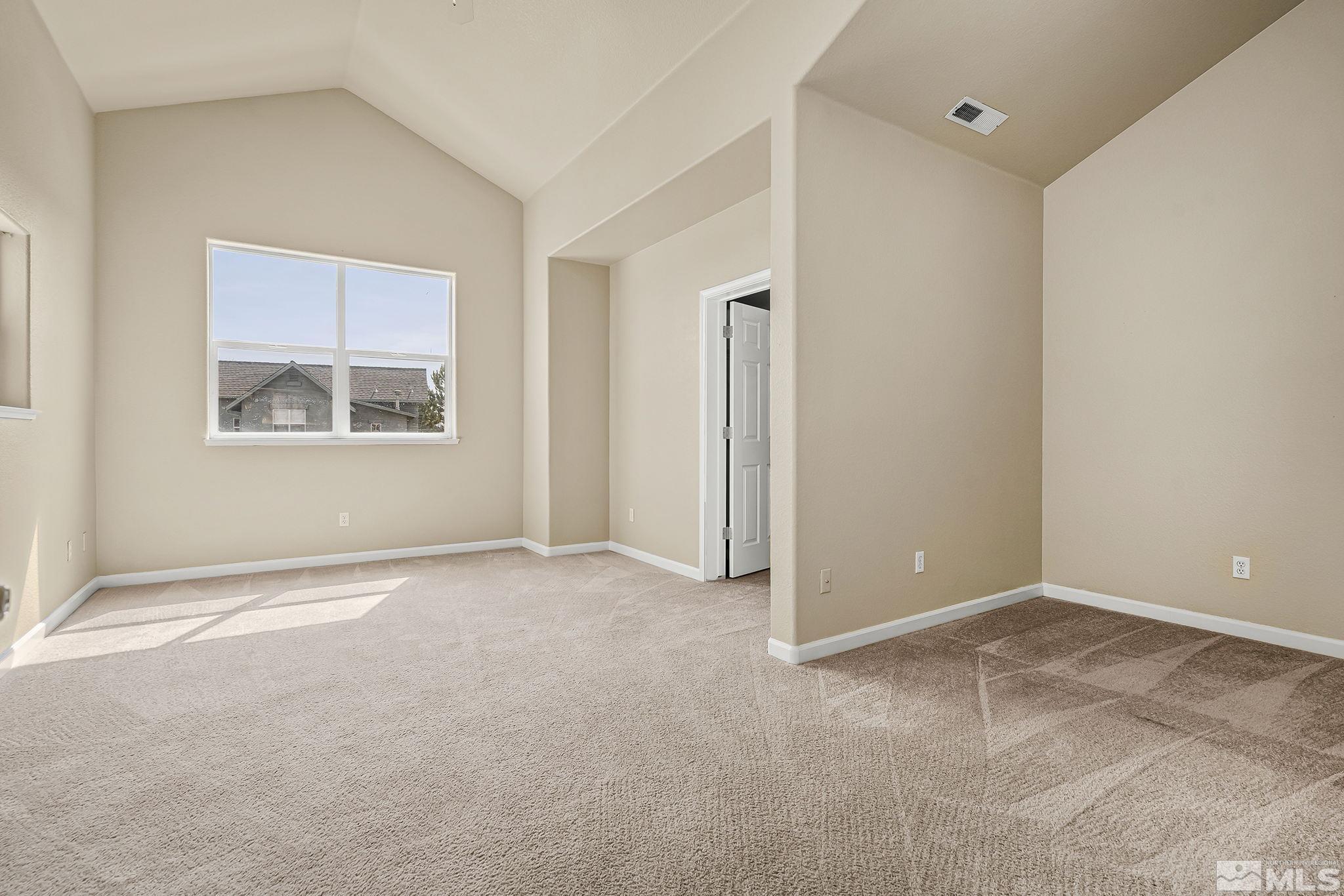 1026 Floral Ridge Way Sparks, NV 89436 - Photo 13 of 22 a view of an empty room with a window