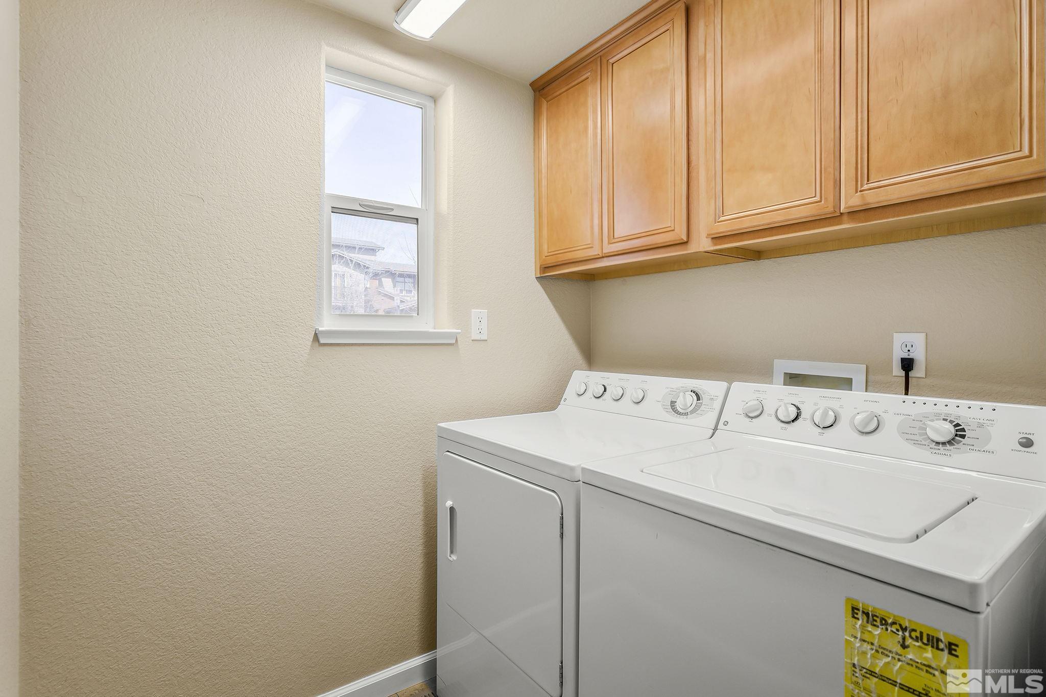 1026 Floral Ridge Way Sparks, NV 89436 - Photo 18 of 22 a utility room with dryer and washer