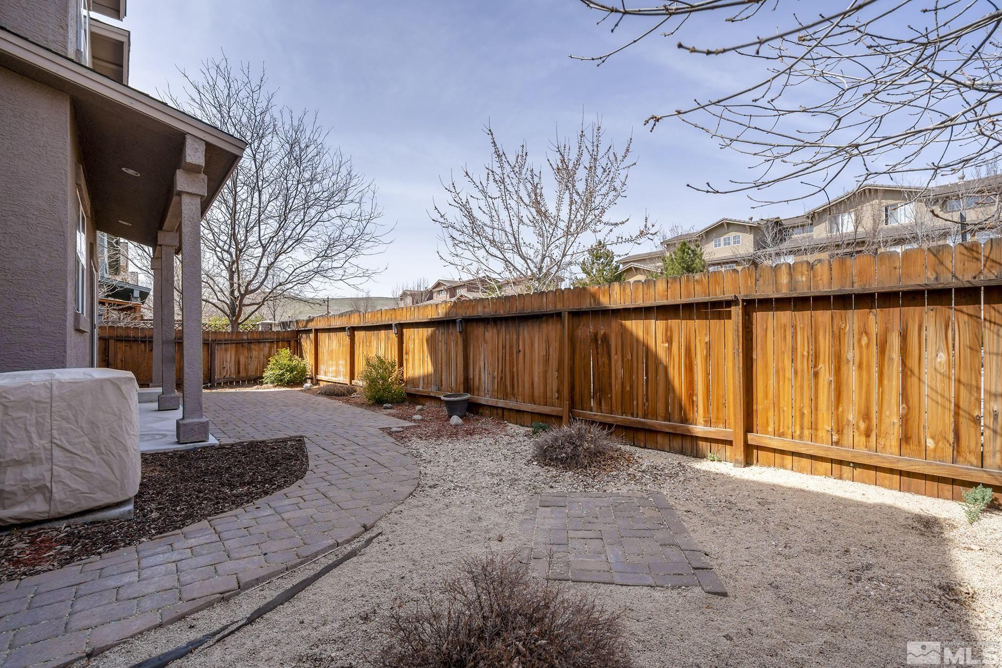 1026 Floral Ridge Way Sparks, NV 89436 - Photo 19 of 22 a view of a backyard of the house