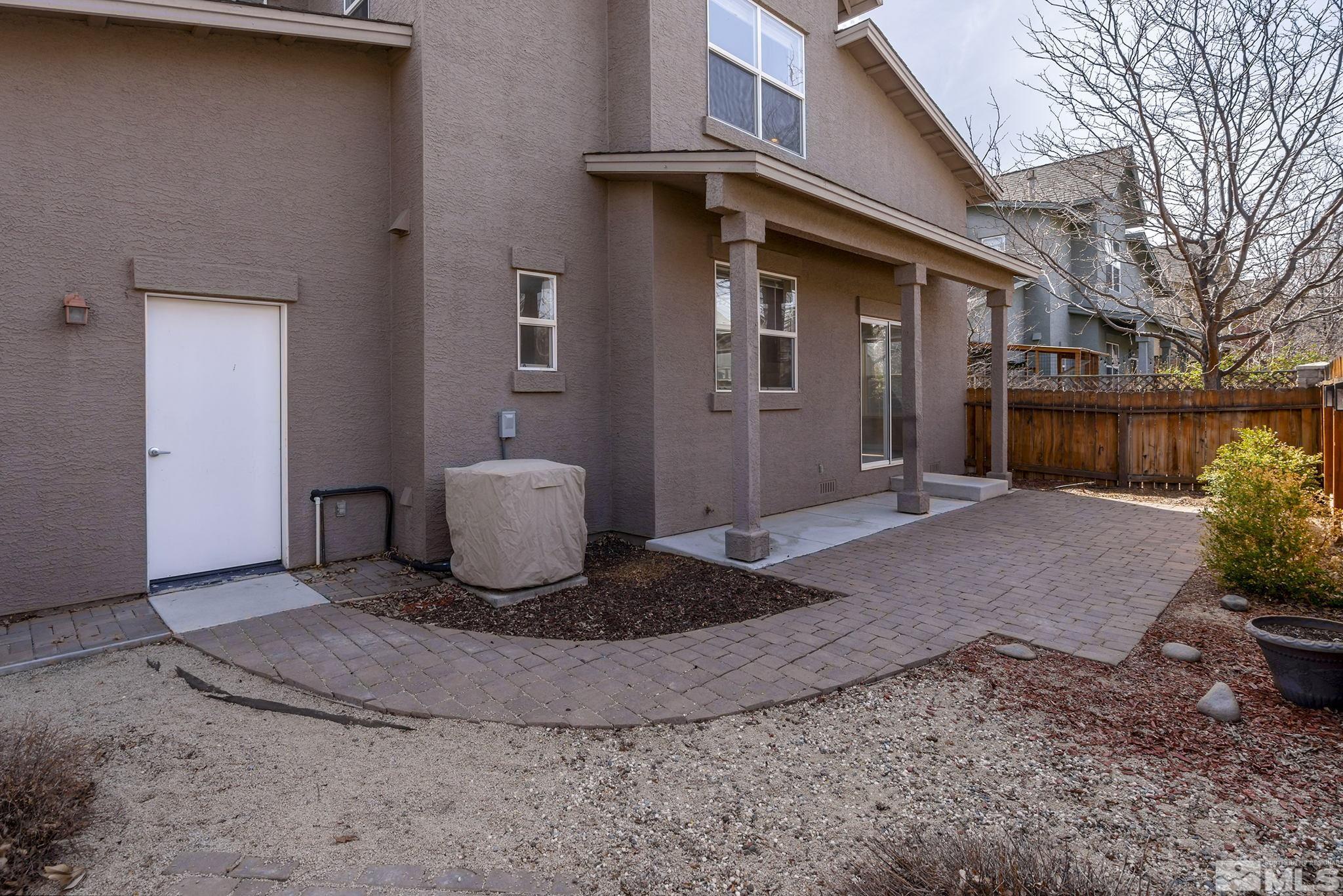 1026 Floral Ridge Way Sparks, NV 89436 - Photo 20 of 22 a view of a house with backyard