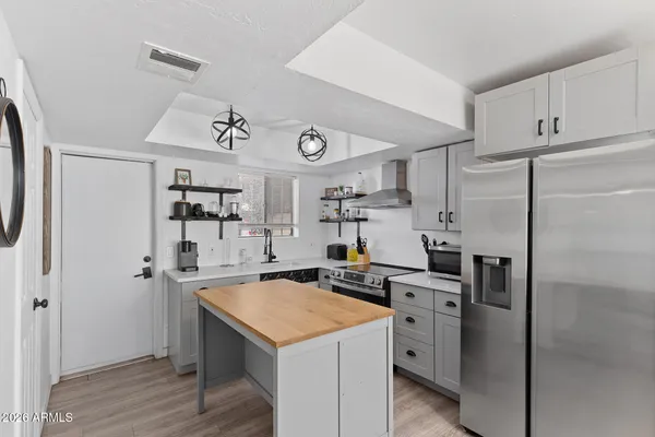 a very nice looking dining room with a table and chairs