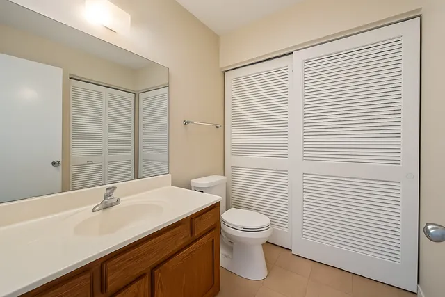 a bathroom with a sink and toilet
