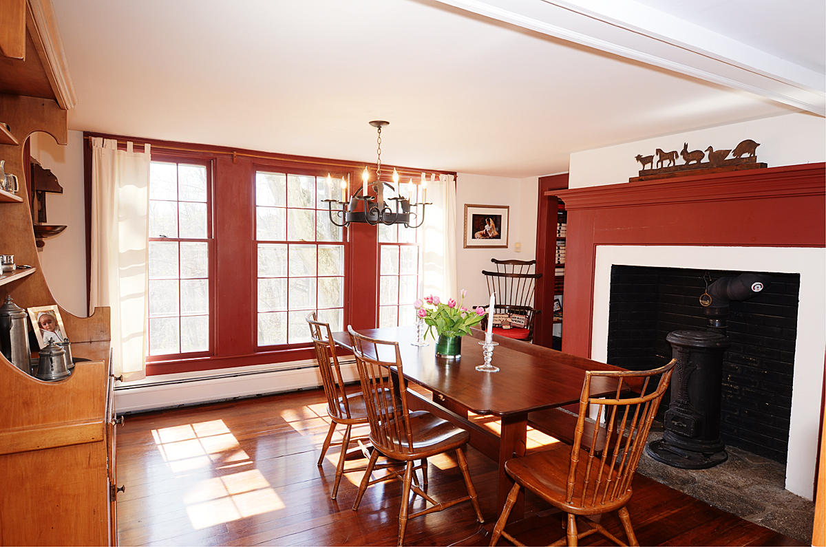 112 Brushy Ridge Road New Canaan, CT 06840 - Photo 15 of 45 a view of a dining room with furniture and wooden floor