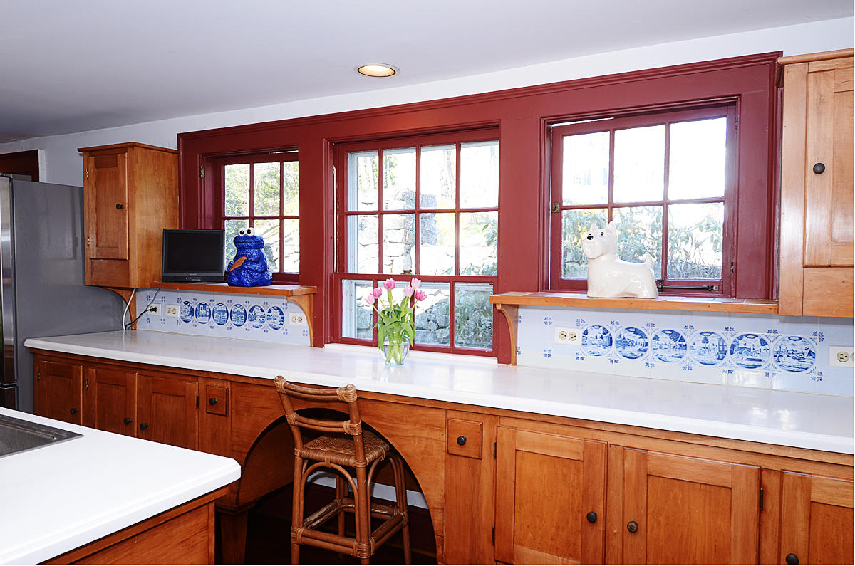 112 Brushy Ridge Road New Canaan, CT 06840 - Photo 17 of 45 a view of a kitchen with granite countertop a sink and a window