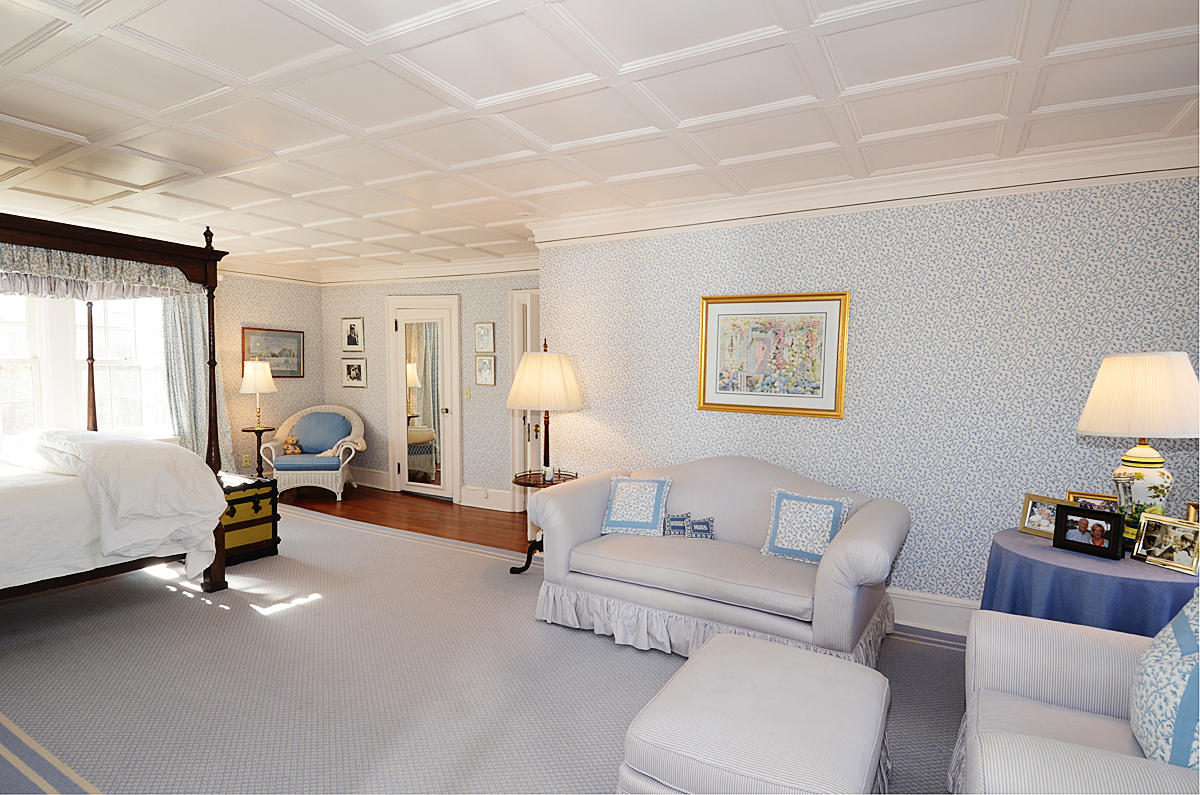 112 Brushy Ridge Road New Canaan, CT 06840 - Photo 20 of 45 a living room with furniture gym equipment and a window