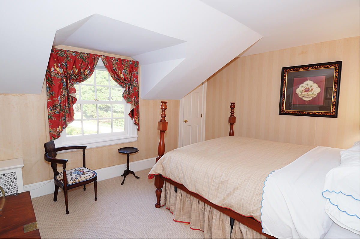 112 Brushy Ridge Road New Canaan, CT 06840 - Photo 23 of 45 a bedroom with bed and a window