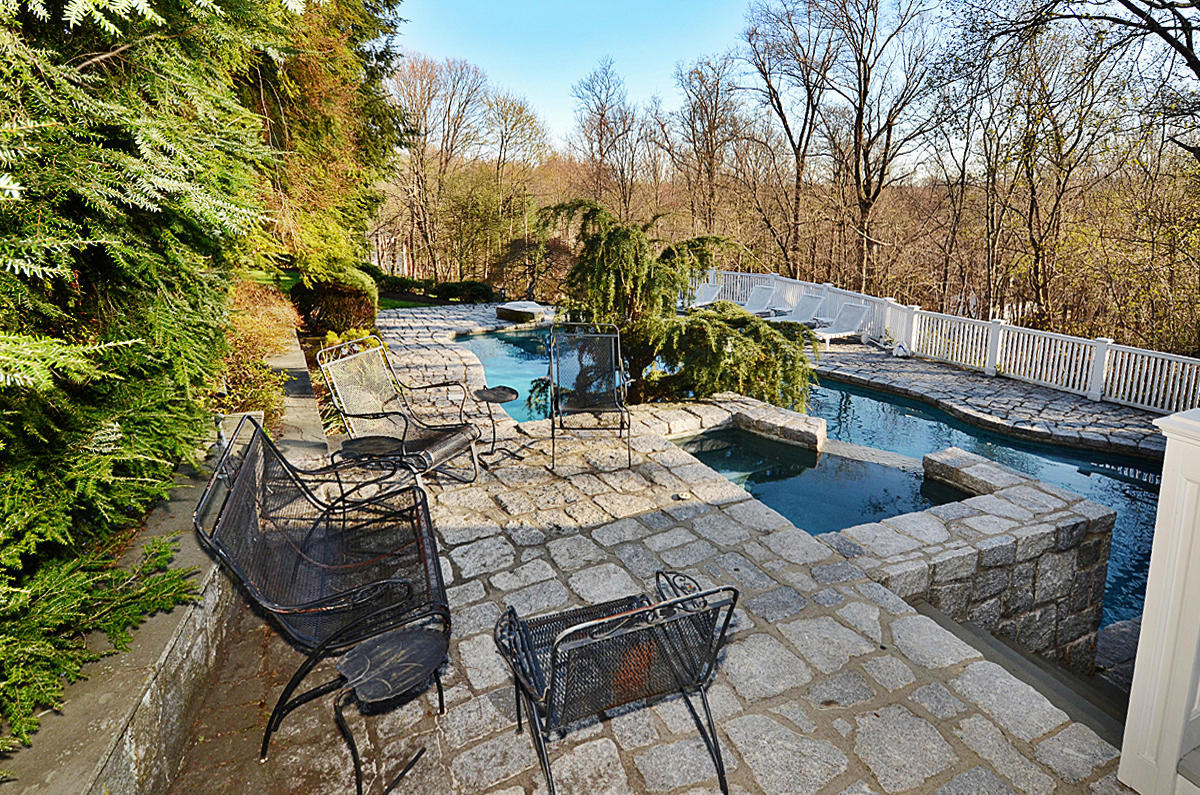 112 Brushy Ridge Road New Canaan, CT 06840 - Photo 33 of 45 a view of a backyard with sitting area