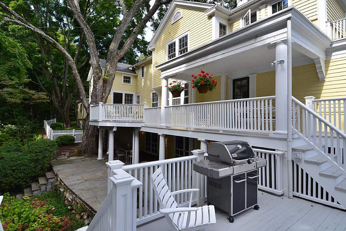 112 Brushy Ridge Road New Canaan, CT 06840 - Photo 38 of 45 front view of a house with a porch