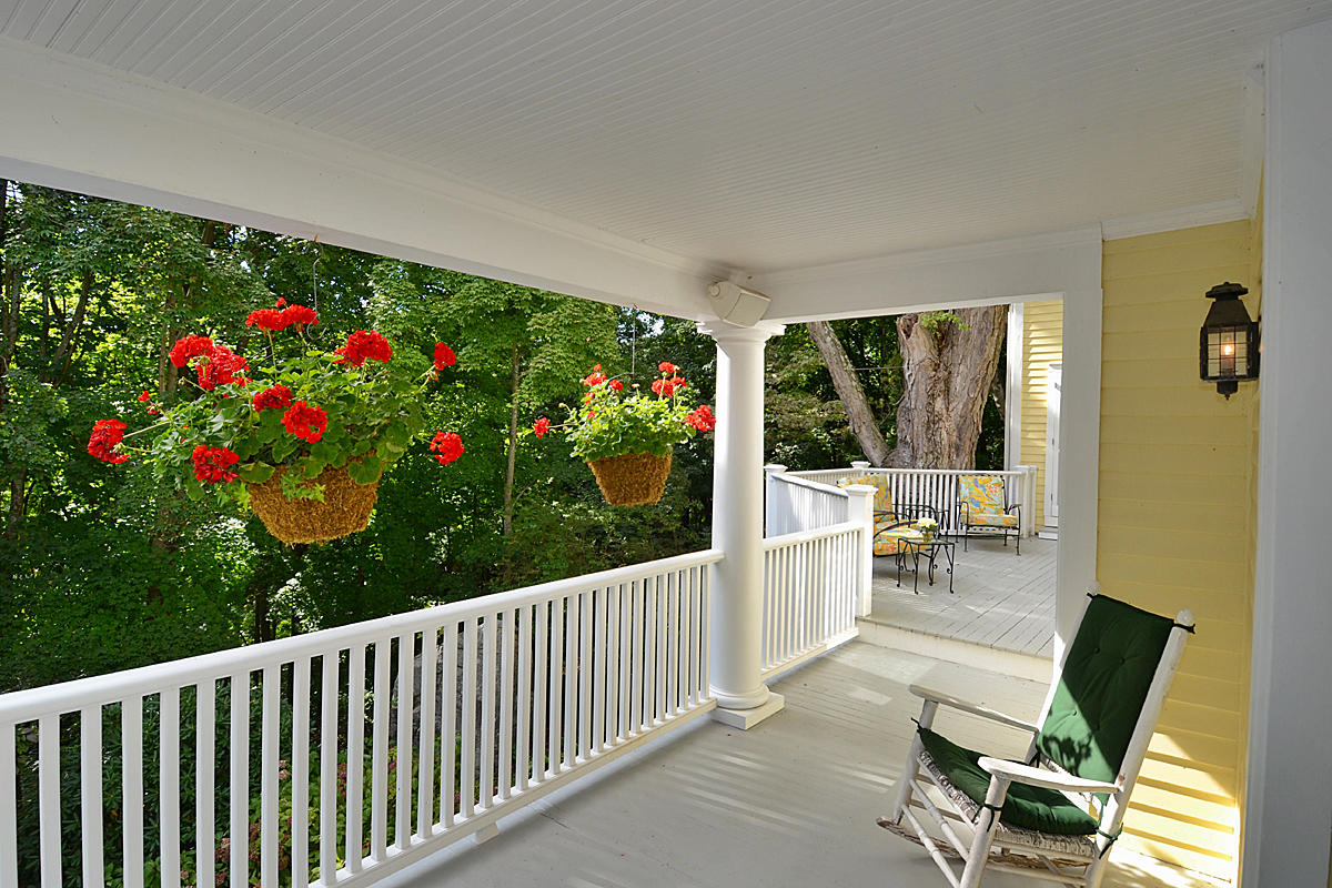 112 Brushy Ridge Road New Canaan, CT 06840 - Photo 39 of 45 a view of two chairs in balcony
