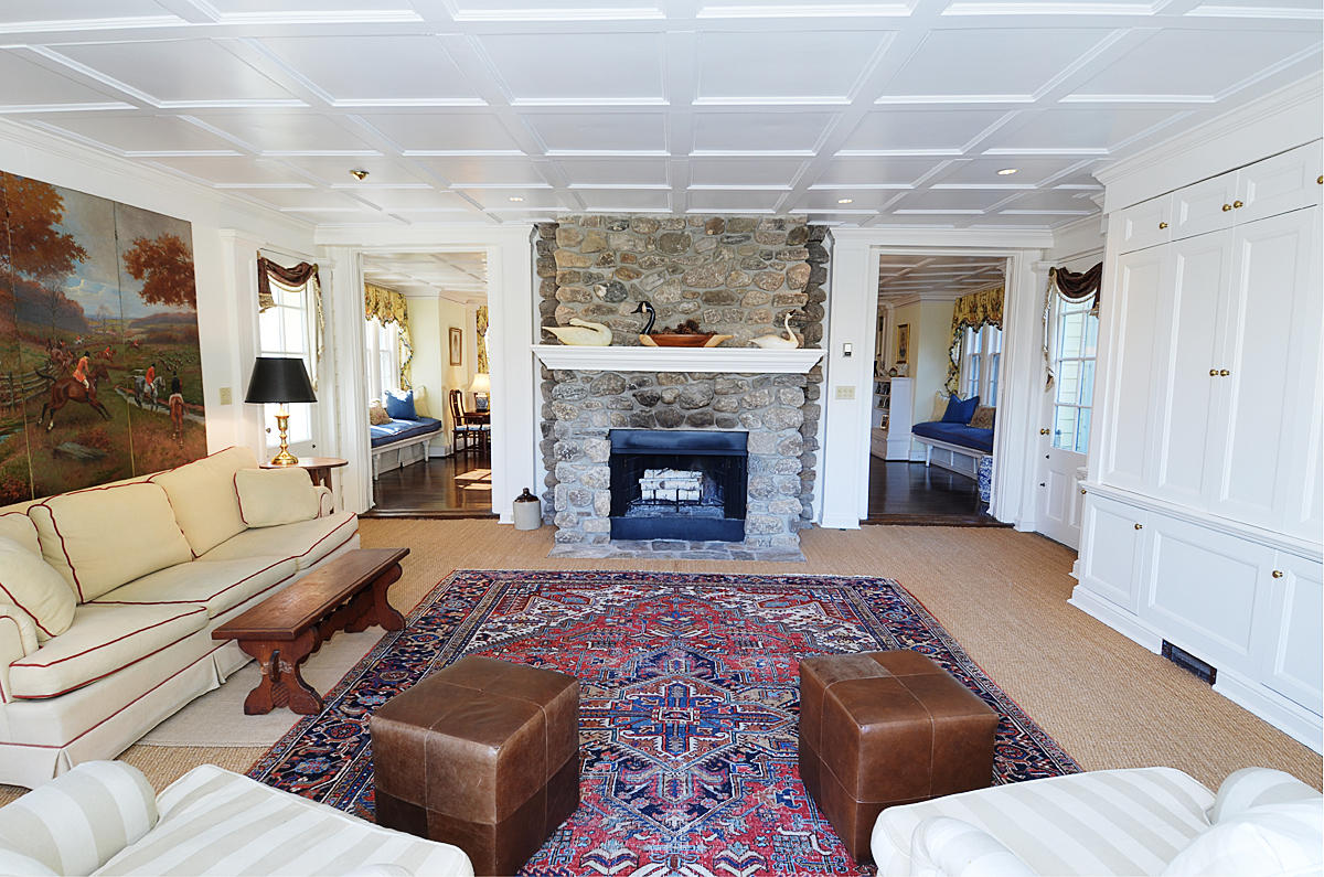112 Brushy Ridge Road New Canaan, CT 06840 - Photo 9 of 45 a living room with furniture and a fireplace
