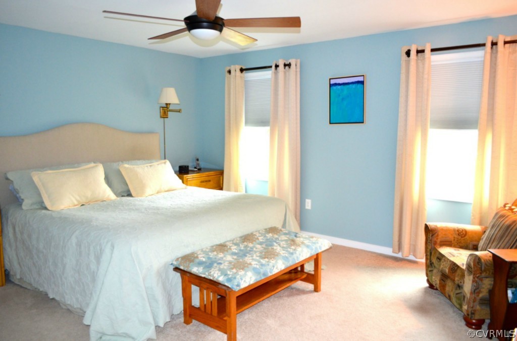 7601 Strath Road Henrico, VA 23231 - Photo 12 of 17 a bedroom with a bed and a table in it