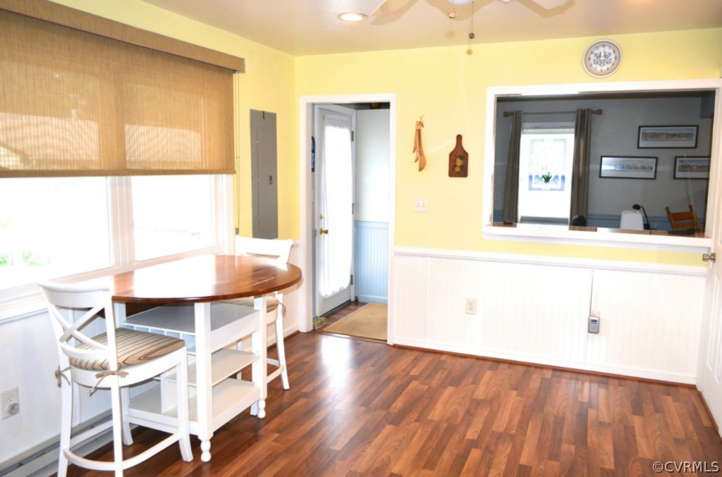 7601 Strath Road Henrico, VA 23231 - Photo 10 of 17 a living room with a table and chairs