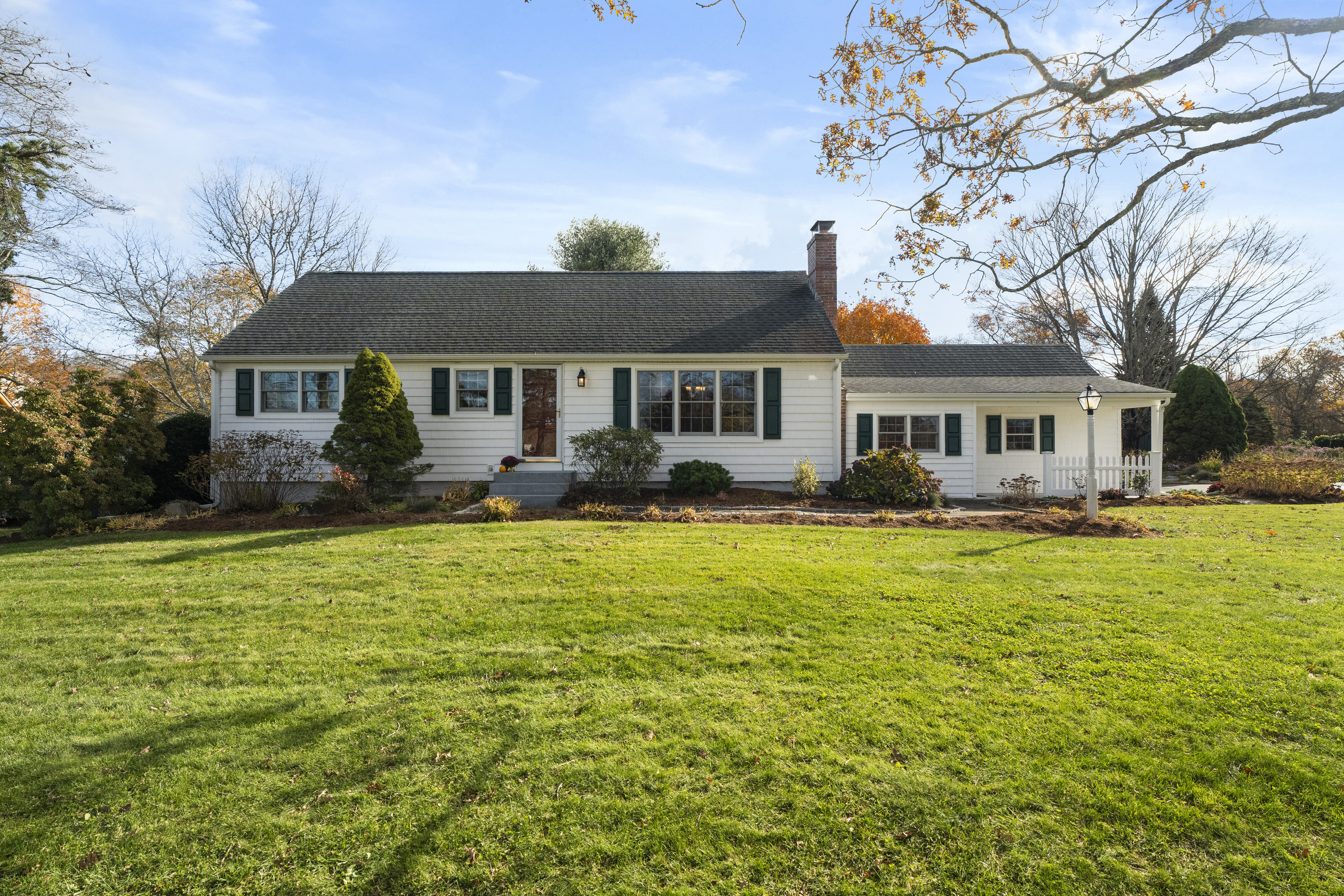 452 Colonel Ledyard Highway Ledyard, CT 06339 - Photo 1 of 35 a front view of house with yard and outdoor seating