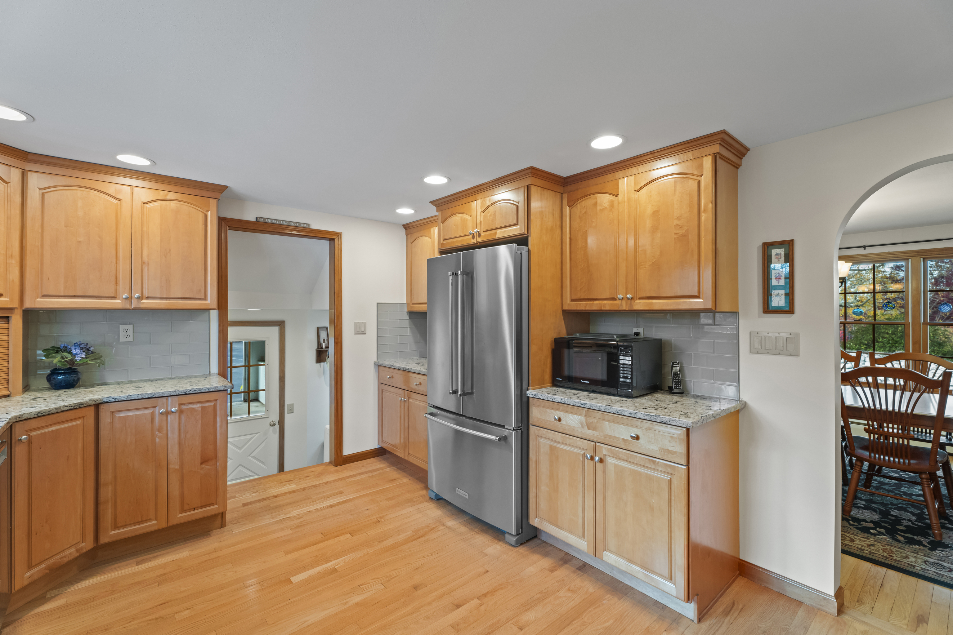 452 Colonel Ledyard Highway Ledyard, CT 06339 - Photo 12 of 35 a kitchen with stainless steel appliances a refrigerator sink and cabinets