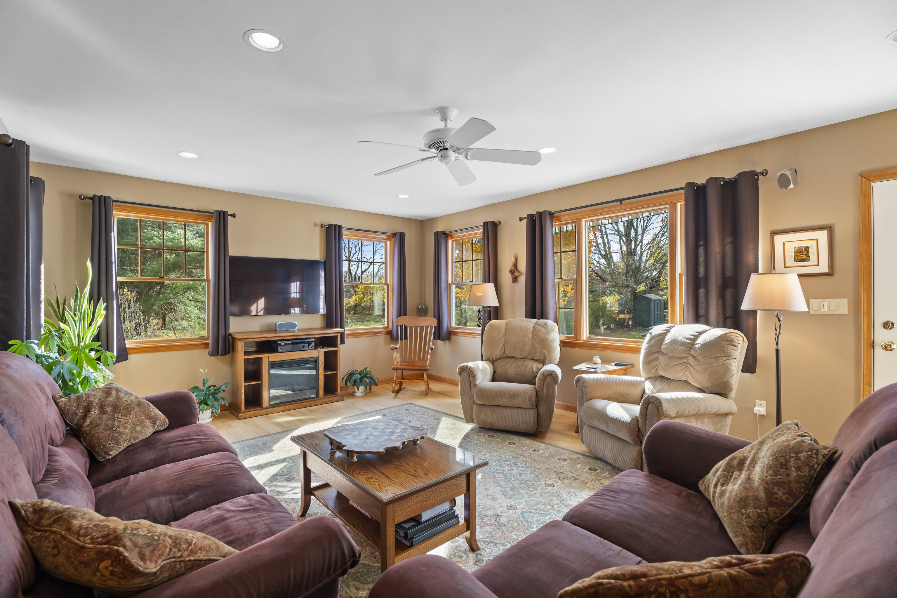 452 Colonel Ledyard Highway Ledyard, CT 06339 - Photo 15 of 35 a living room with furniture ceiling fan and a large window