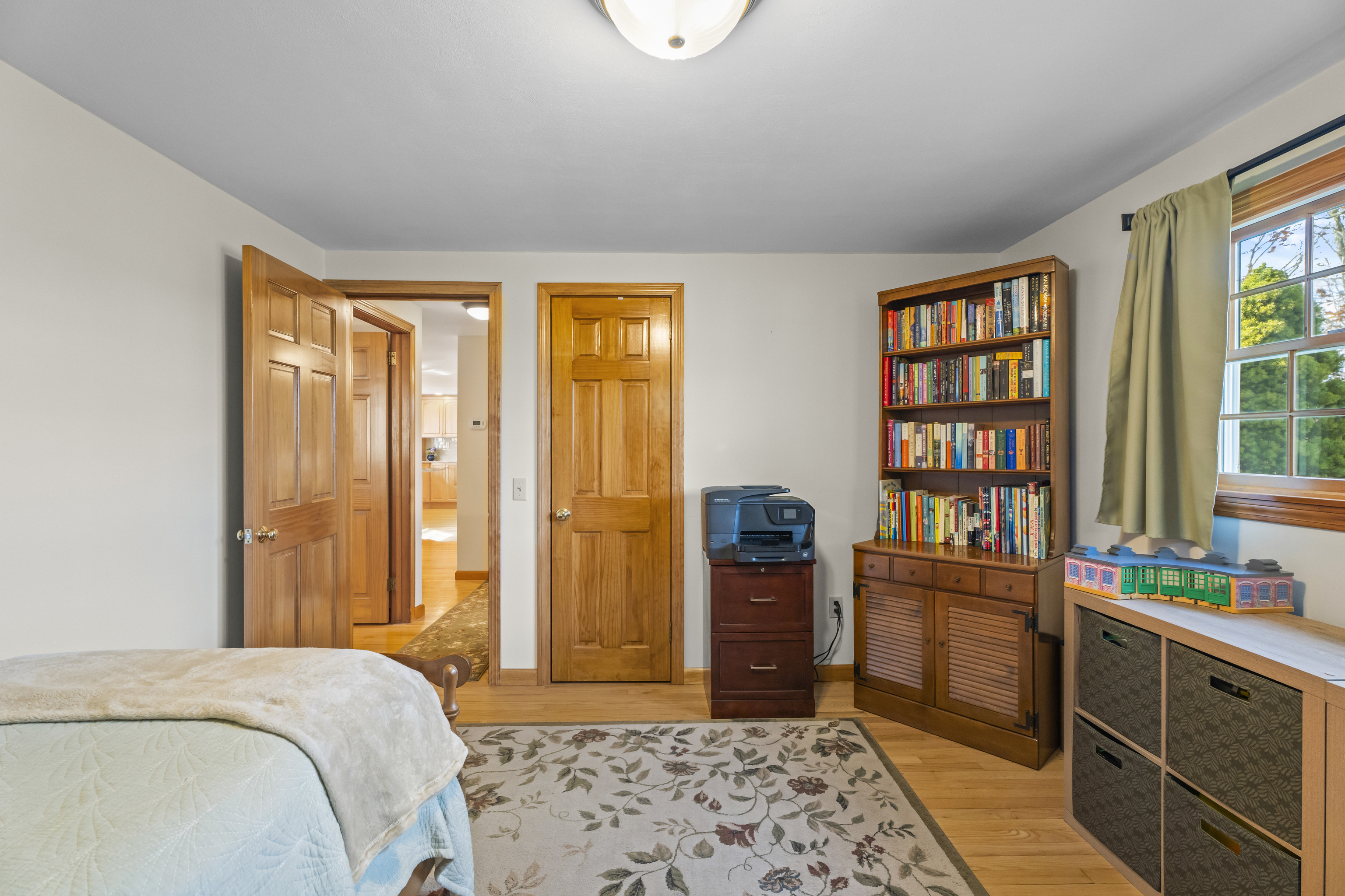 452 Colonel Ledyard Highway Ledyard, CT 06339 - Photo 22 of 35 a bedroom with a bed and a window