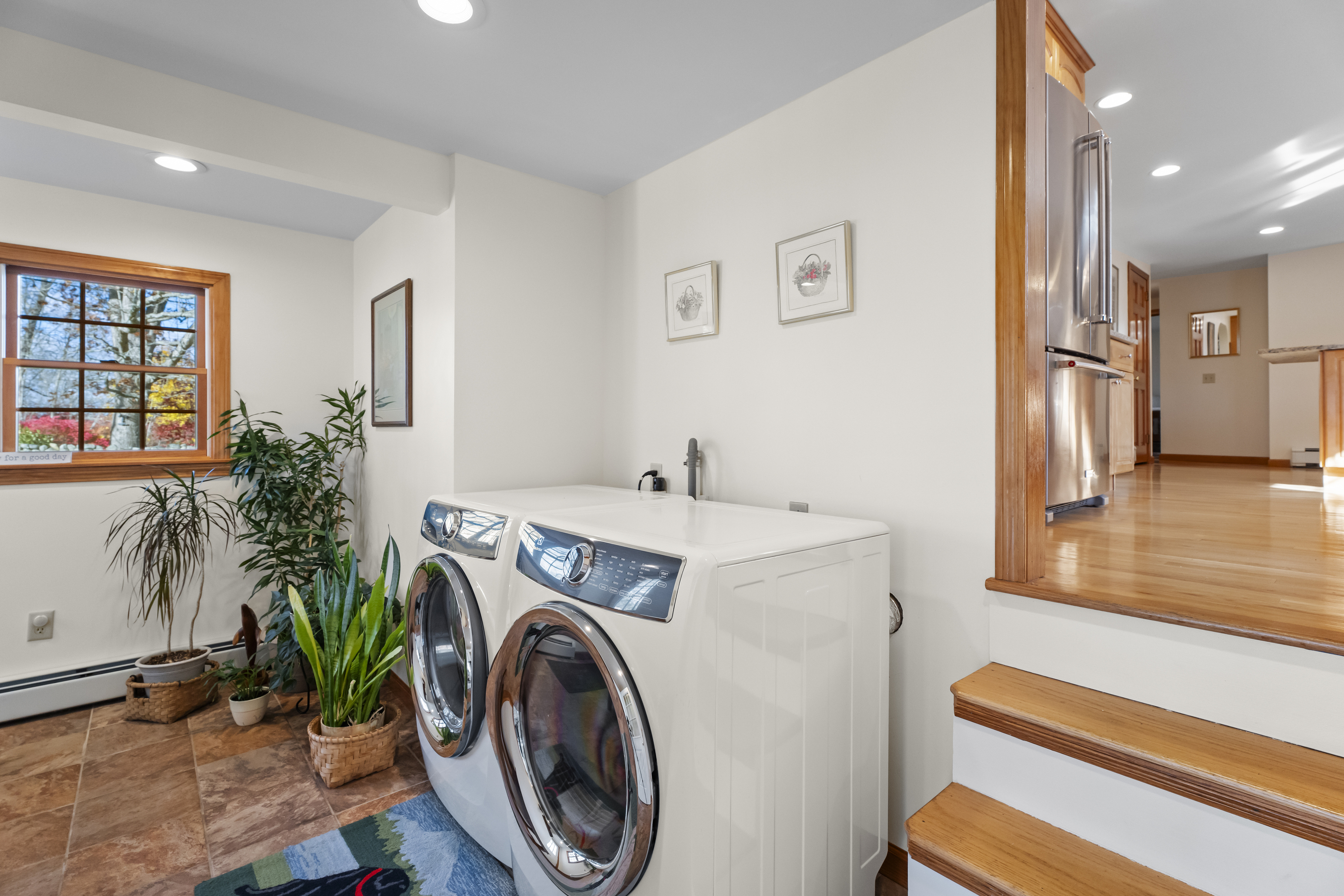 452 Colonel Ledyard Highway Ledyard, CT 06339 - Photo 28 of 35 a view of a hallway with washer and dryer
