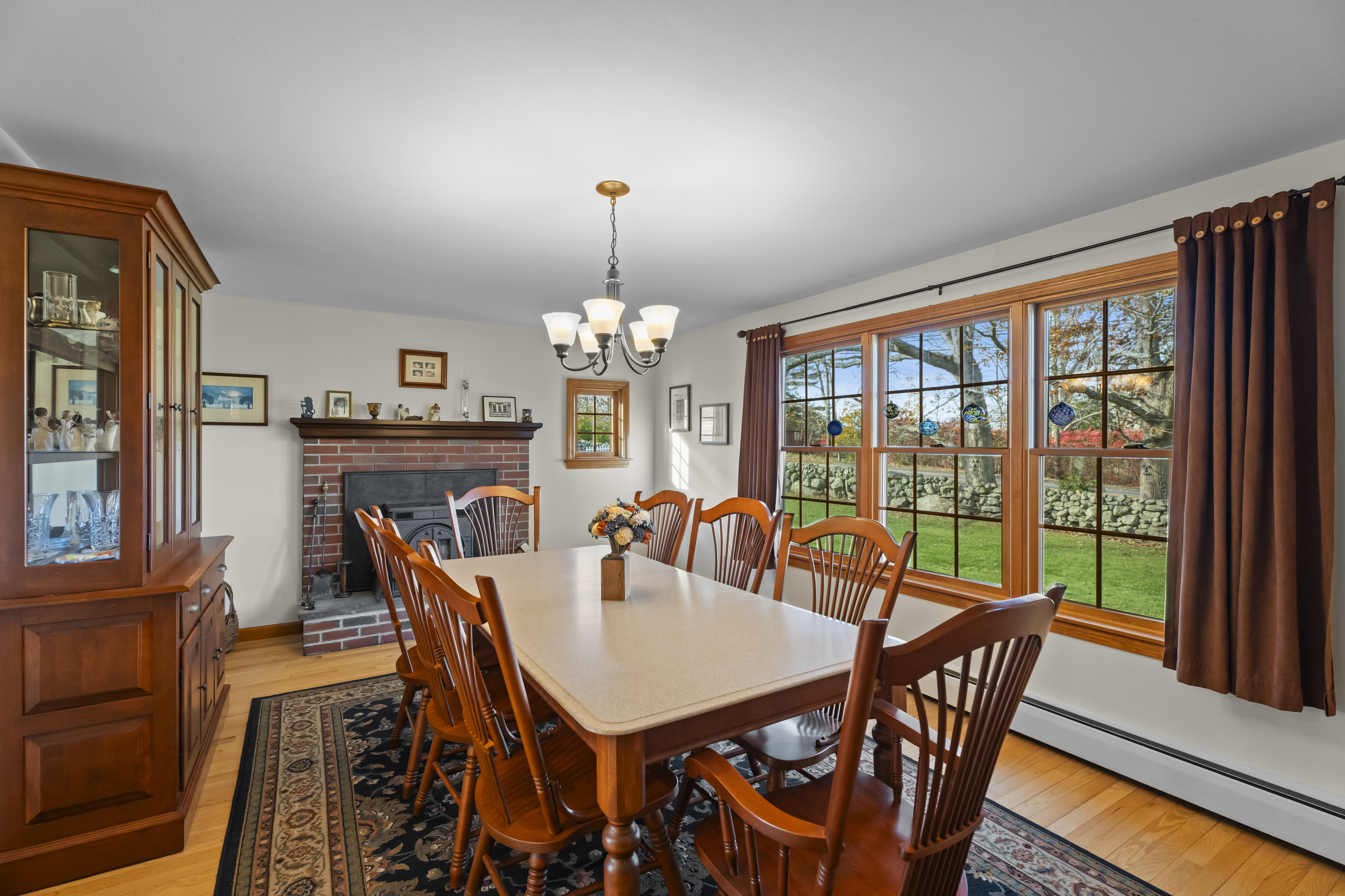 452 Colonel Ledyard Highway Ledyard, CT 06339 - Photo 7 of 35 a view of a dining room with furniture window and wooden floor