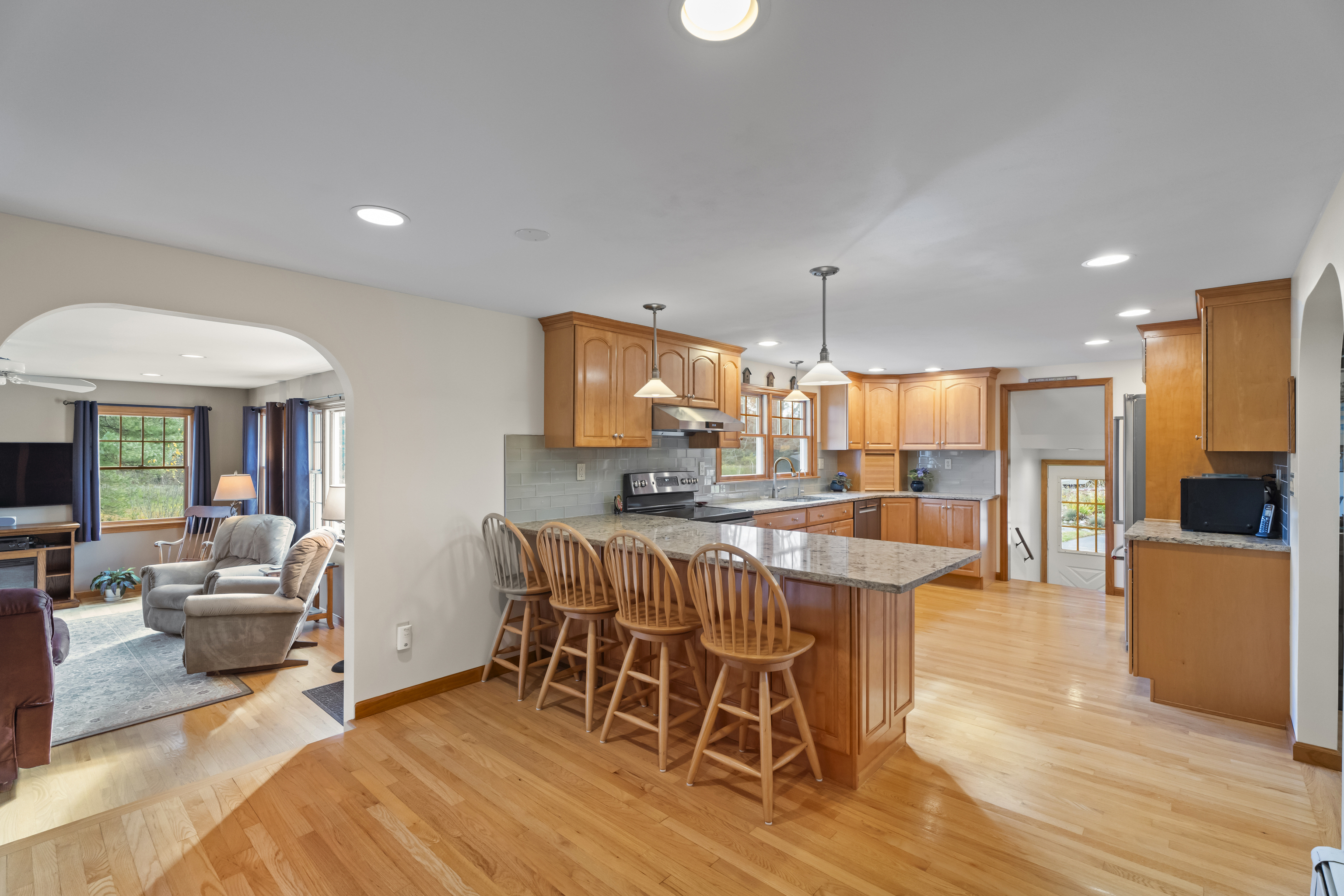 452 Colonel Ledyard Highway Ledyard, CT 06339 - Photo 9 of 35 a view of a dining room with furniture window and wooden floor