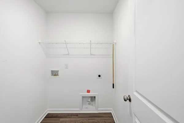 an aerial view of residential houses with city view