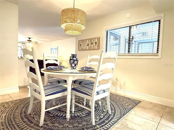 a view of a dining room with furniture