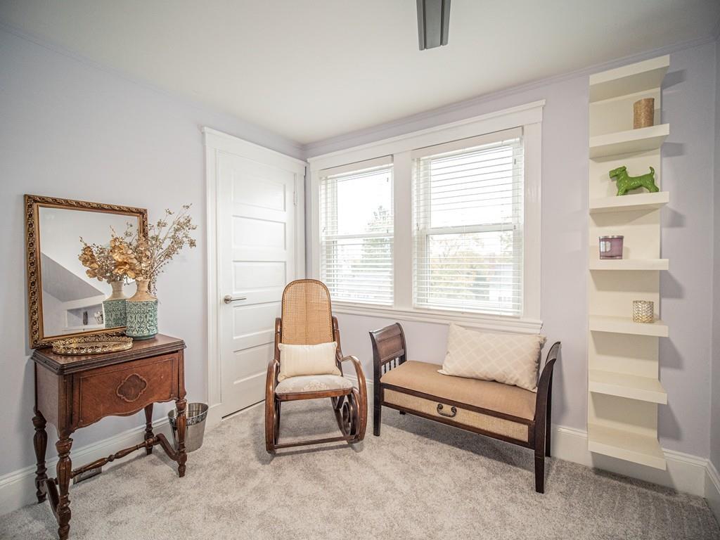 26 Edgehill Road Braintree, MA 02184 - Photo 22 of 27 a living room with furniture and a window