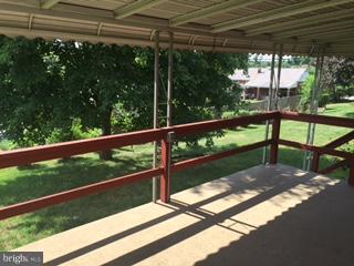 1522 Burnfield Road Baltimore, MD 21237 - Photo 12 of 20 a view of balcony with wooden floor